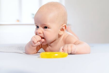 bright portrait of adorable baby boyの写真素材