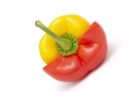 Red and yellow pepper on white backgroundの写真素材