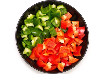 Variation of red and green peppers on a plate diagonallyの写真素材
