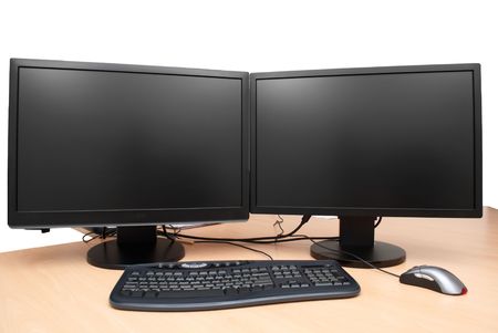 Two black monitors on the tableの写真素材