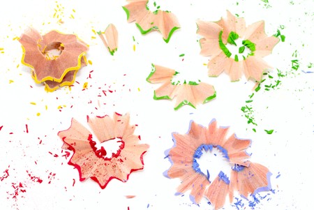 Colored pencil shavings isolated on wwhiteの写真素材