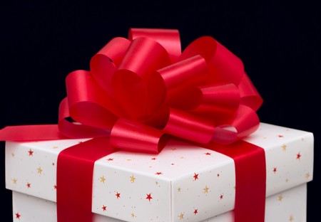 White gift box isolated on blackの写真素材