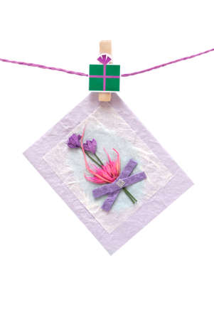 Greeting card hanging with closepinの写真素材
