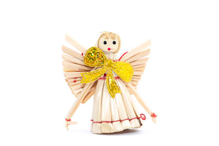 Straw angel isolated on whiteの写真素材