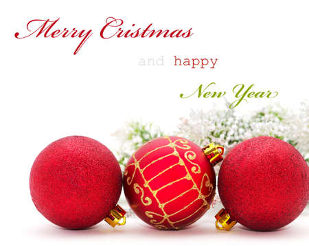 Christmas greeting card with red baubles and sample textの写真素材