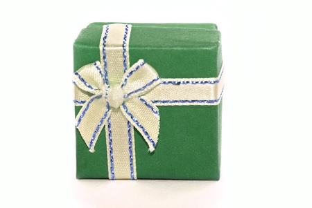 Green gift box isolated on whiteの写真素材