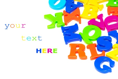 Colorful magnet letters isolated on white background (with space for sample text)の写真素材