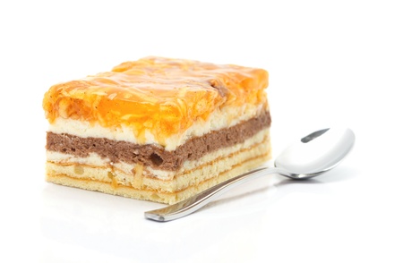 Apple cake with a spoon iaolated on white backgroundの写真素材