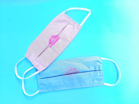 Lipstick stain on fabric face masks because of make-up with colored background