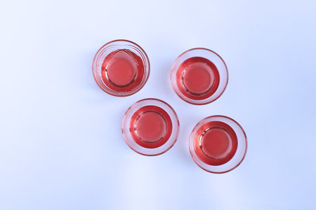 Delicate cranberry jelly on a white background. The view from the topの写真素材