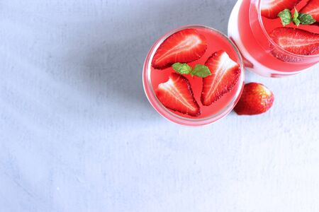 Cream souffle with strawberries on a gray background. The view from the top. Delicious dessert.の写真素材