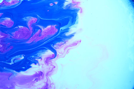 Abstract background of acrylic paint in blue, pink and purple tones.の写真素材