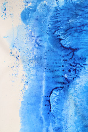 Abstract blue watercolor on white paper background. Hand-drawn illustration.の写真素材