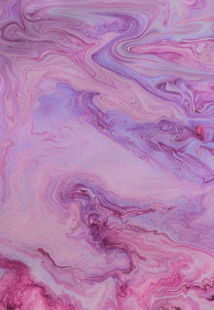 abstract background of acrylic paint in shades of pink and purple colors