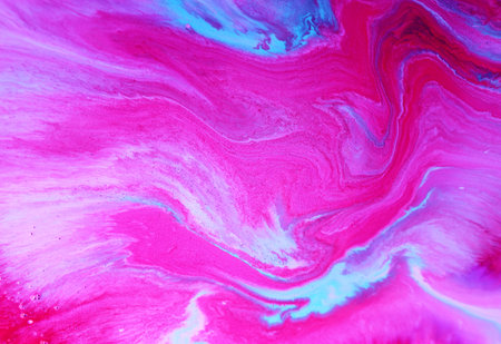 Abstract background of acrylic paint in pink and blue tones. Liquid marble texture