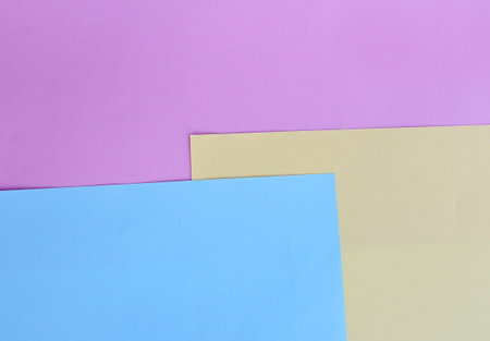 Colorful pastel paper background. Flat lay, top view.