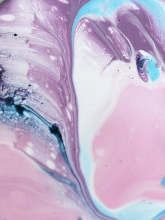 Abstract background of acrylic paint in pink and blue tones. Macro photography