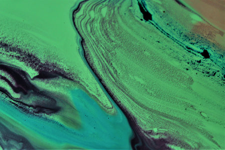 Marbled blue and green abstract background. Liquid marble ink pattern.