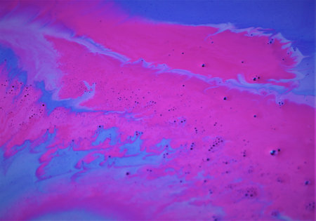 Abstract background of oil paint in blue and pink tones. Macro photography