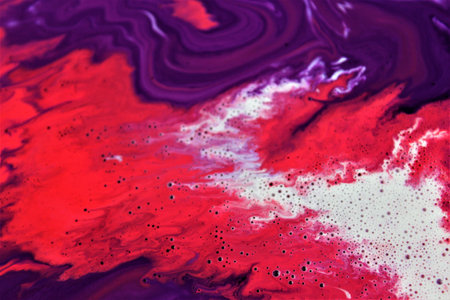 Abstract background of acrylic paint in red and blue tones. Close-up
