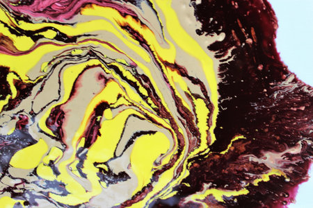 Abstract background of acrylic paint in yellow and red tones. Close-upの写真素材
