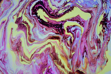 Abstract background of acrylic paint in pink and blue tones. Liquid marble pattern.