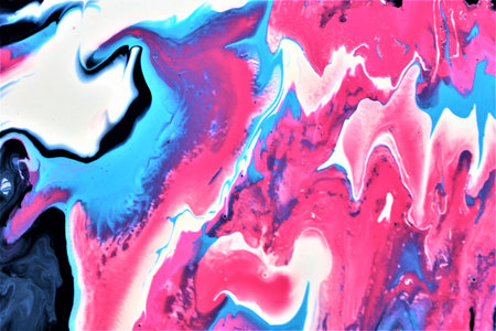 abstract background of pink and blue paint mixing in the water.