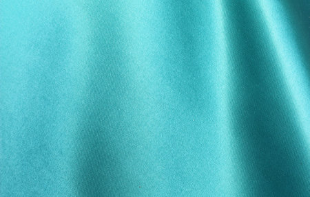 close up of blue satin cloth texture for background and design.の写真素材