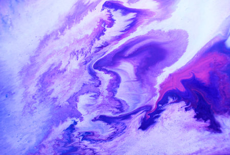 Marbled blue and purple abstract background. Liquid marble ink pattern.