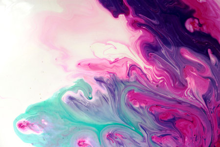 abstract background of pink and blue mixed paints in water closeup