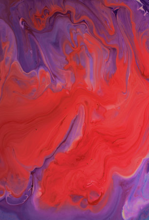 abstract background of acrylic paint in red, purple and blue colorsの写真素材