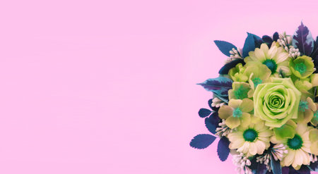 Flower bouquet on pink background. Flat lay, top view.の写真素材