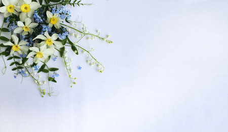 Bouquet of spring flowers on white background with copy space.