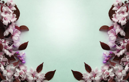 cherry blossom frame on blue background with copy space for text