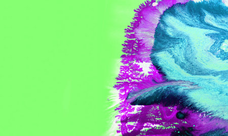 abstract background with blue and purple stains of paint on a green background