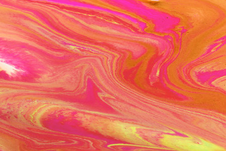 Abstract background of acrylic paint in pink and yellow tones. Liquid marble textureの写真素材