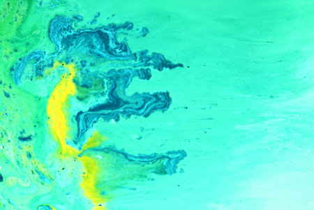 abstract background of acrylic paint in green and blue color with waves