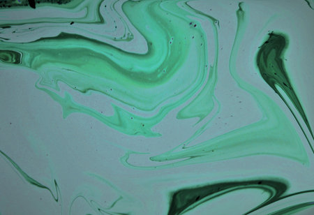 abstract green background with a pattern of lines and spots in it
