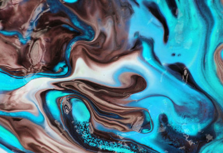 Abstract background of mixed acrylic paints in blue and white colors. High quality photo