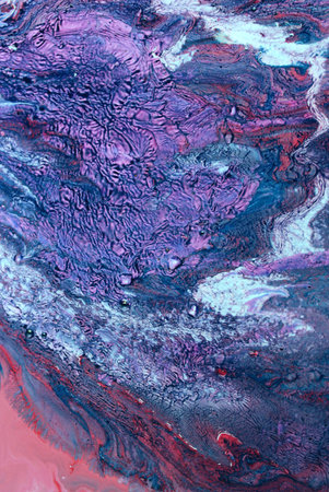 Abstract background of acrylic paint in blue and pink tones with water drops