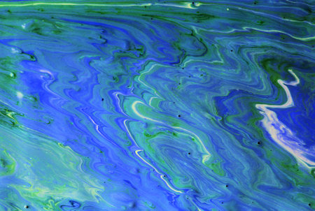 Abstract background of acrylic paint in blue and green tones. Liquid marble pattern