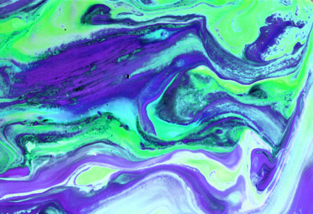 Abstract background of acrylic paint in blue and purple tones. Liquid marble texture