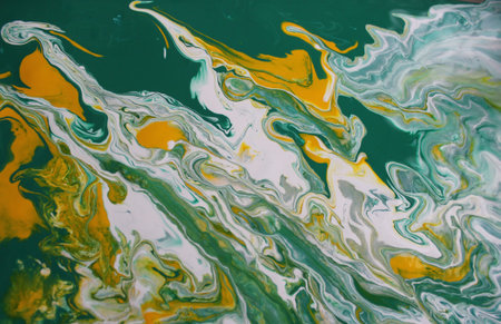 Abstract background of acrylic paint in yellow, green and white colors.の写真素材