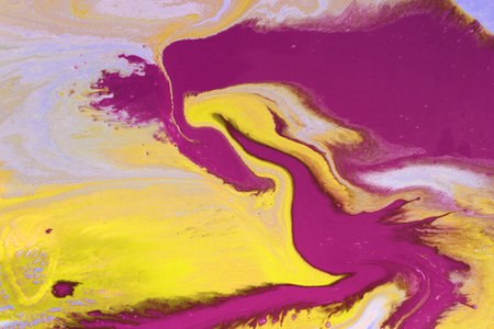 Abstract background of acrylic paint in yellow, purple and pink tones.の写真素材