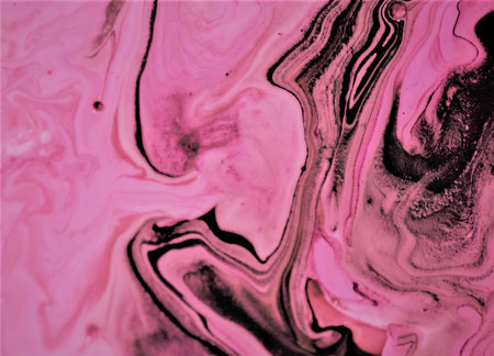 Pink and black abstract background. Liquid marble pattern. Fluid art.の写真素材