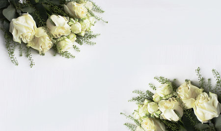 Bouquet of white roses on white wooden background. Flat lay, top view.の写真素材