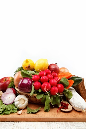 Healthy food  Fresh vegetables and fruits on a wooden board の写真素材