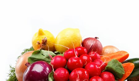 Healthy food  Fresh vegetables and fruits on a wooden board の写真素材