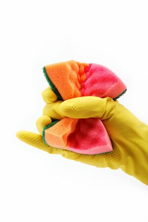 Hand with rubber glove and cleaning sponge on white backgroundの写真素材