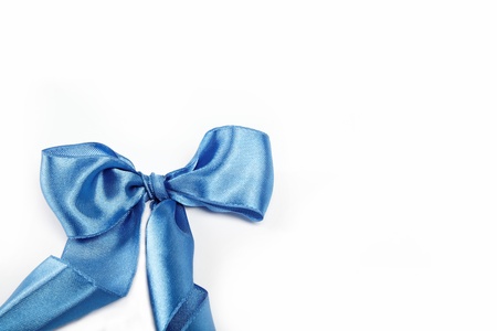 Blue satin gift bow. Ribbon. Isolated on white.の写真素材